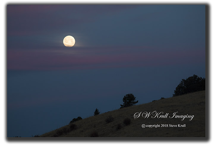 Moonset over the Sangre de Cristo Mountain Range of Colorado in the springtime